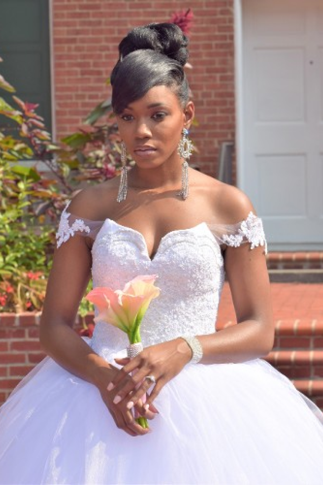 Bride Holding a Flower